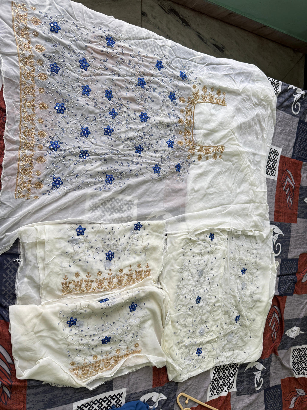Ivory Blue Floral Hand Embroidered Unstitched Suit (Lining Will Be Provided)