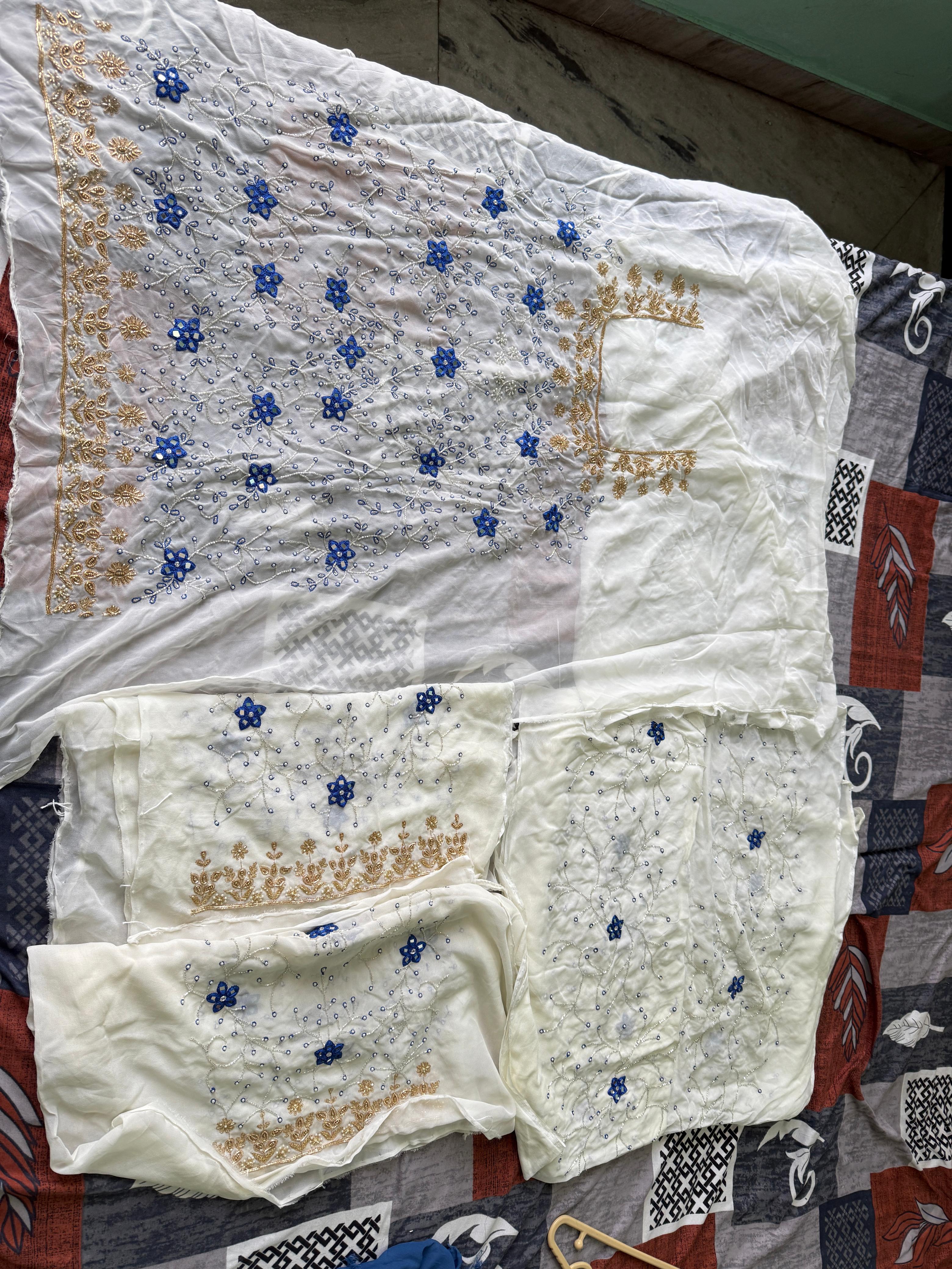 Ivory Blue Floral Hand Embroidered Unstitched Suit (Lining Will Be Provided)